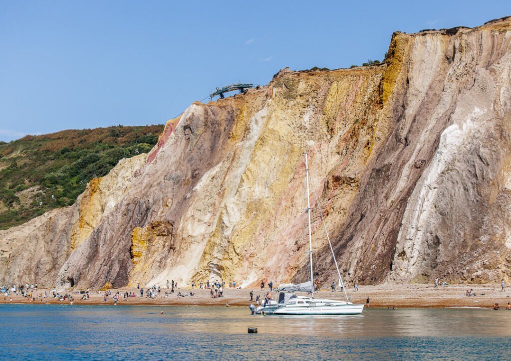 boat moored up at alum bay
