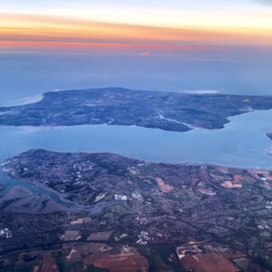 A New Dawn Over the Isle of Wight aerial sunrise photograph overlooking Portsmouth, the Solent and the Isle of Wight