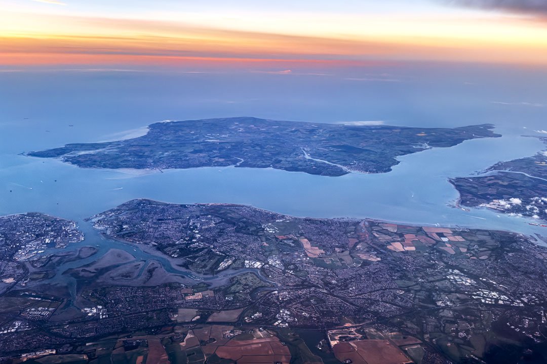 A New Dawn Over the Isle of Wight aerial sunrise photograph overlooking Portsmouth, the Solent and the Isle of Wight