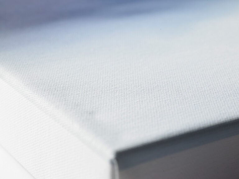 Close-up of the artist-grade cotton canvas showing the texture and detail of Sunset at Newtown Creek.